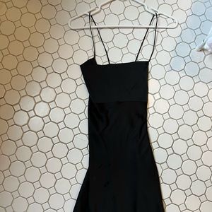 Black satin mini dress with cowl neck and adjustable straps